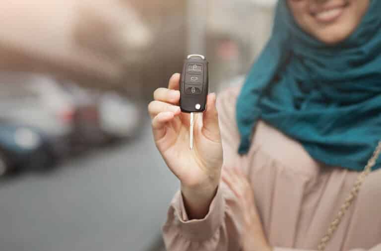 women with a car key